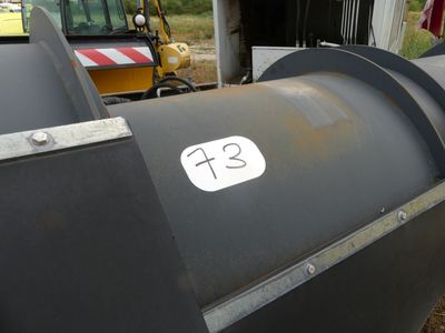 an image of a large black barrel with a number 32 on it