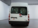 a white van that is parked in a large room