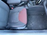 a picture of the inside of a car with the seats down