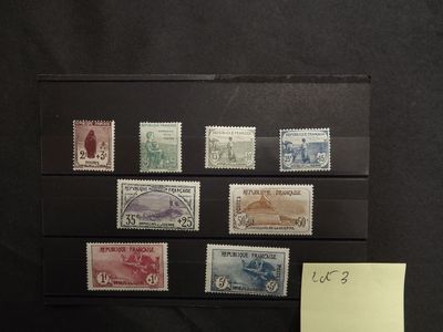 a picture of a collection of stamps on a black background