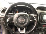 the interior of a car with a steering wheel and dashboard controls