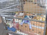 a cart with a lot of food inside of it