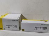 two boxes that are next to each other on a table