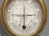 a clock that is hanging on the wall in the room