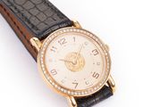 an image of a close up of a wrist watch on a white background