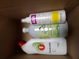 two bottles of hand sanitizer in a cardboard box