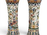 pair of chinese vases with birds and flowers painted on them