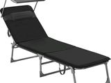 an image of a black lounger with a tray on top of it