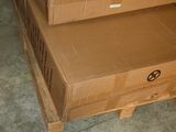three boxes stacked on top of each other on the floor