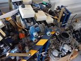 a pile of assorted items sitting on a pallet