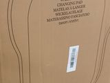 a cardboard box that has a picture of a guitar in it