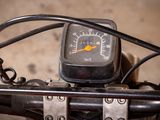 a close up of a motorcycle with a speedometer on it
