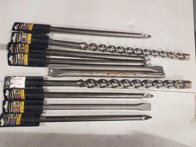 several different types of tools are lined up on a table
