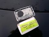 a cell phone that is sitting on top of a car