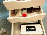a drawer that has a lot of items inside of it