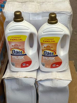 two bottles of detere sit on top of a stack of boxes