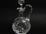 crystal decanter on a black background with a black background
