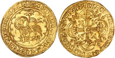 a gold coin with an image of a bird on it