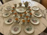 a table with a lot of plates and cups on it