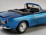 an image of a blue classic car on a white background