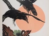 deux oiseaux assis sur une branche d'arbre