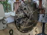 a clock that is on the window sill in the room
