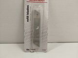a small plastic knife in the package on the table