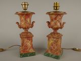 pair of red and green marble lamps with gold accents on stands