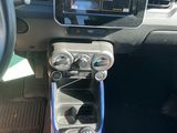 a car dashboard with a steering wheel and a dash panel