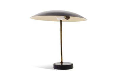 an image of a black and gold lamp on a white background