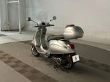 a scooter that is parked in a garage