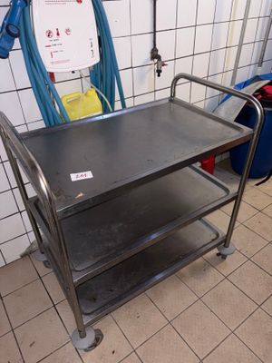 a metal cart that is sitting in a room