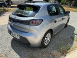 a silver car that is parked in a lot