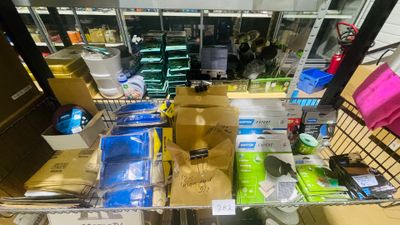 a shopping cart full of items in a store