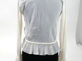 a mannequin with a white shirt on a mannequin stand