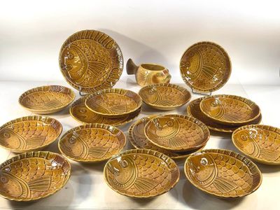 a lot of bowls that are sitting on a table