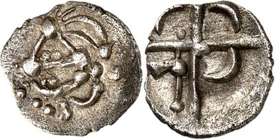 a silver coin with a cross on the front and a cross on the back