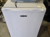 a stack of white appliances sitting on top of each other