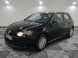 a picture of a black volkswagen golf in a garage