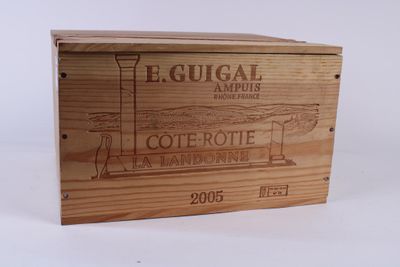 une boîte en bois sur laquelle est représenté un phare