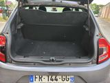 a trunk of a car with the back door open