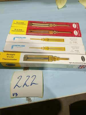 four different pens and a pen that are on a table
