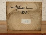 a picture of a piece of wood with writing on it