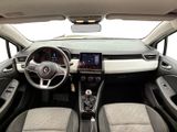 the interior of a small car with a steering wheel and dashboard