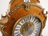 a clock that is sitting on top of a table