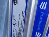 a close up of a blue and white label on a bike tire