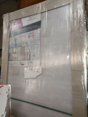 a picture of a refrigerator in the middle of a room