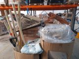 boxes and brooms are stacked on top of each other in a warehouse
