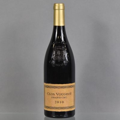 a bottle of wine that is sitting on a table