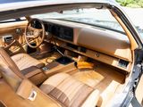 dashboard of a car with tan leather seats and tan leather trim